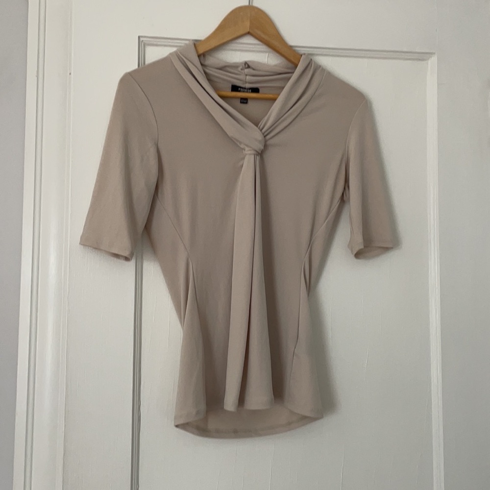 tan blouse